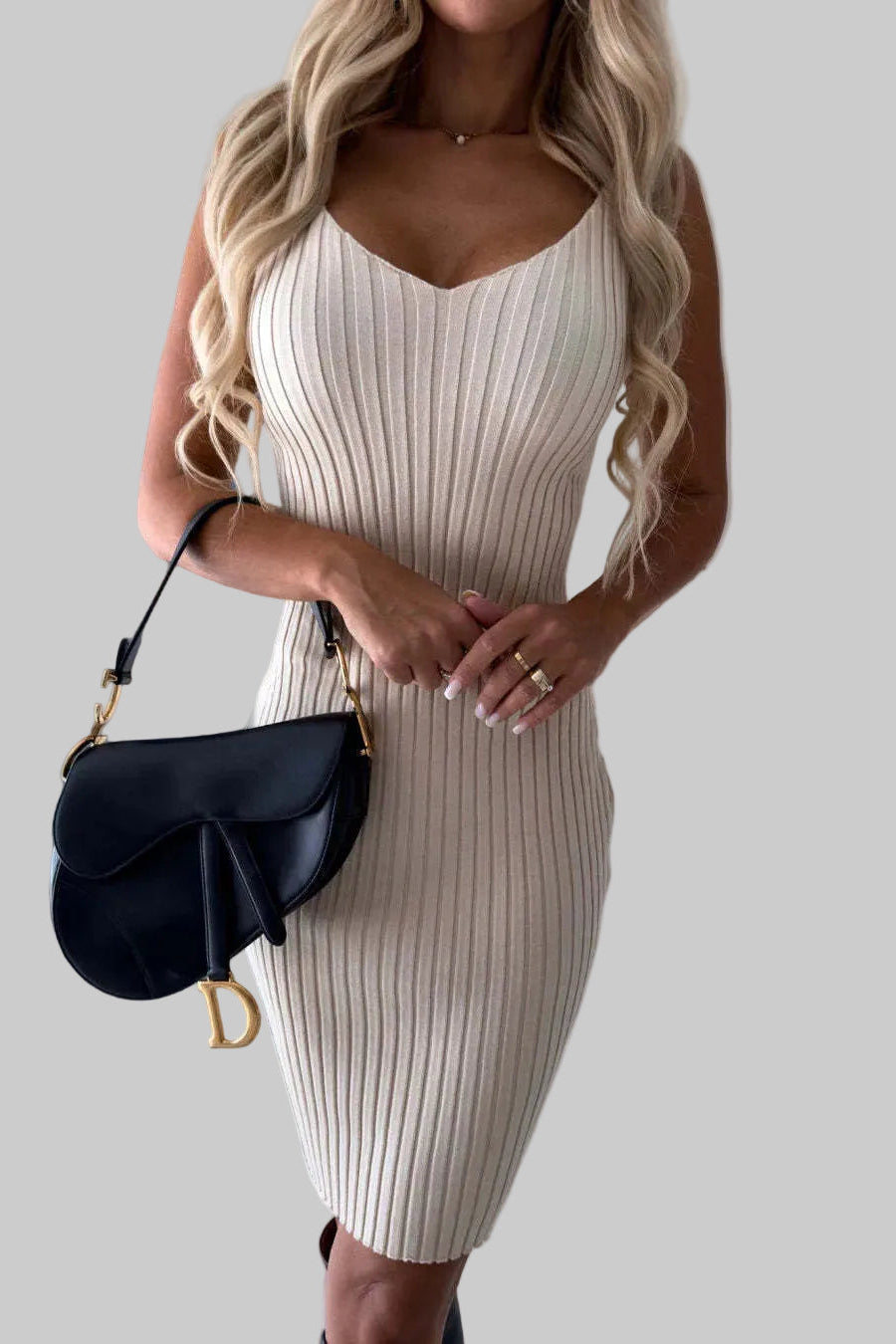 Model wearing The Victoria Ribbed Pinafore Set in Cream - part of the Michelle Victoria Wear Spring Awakening Collection